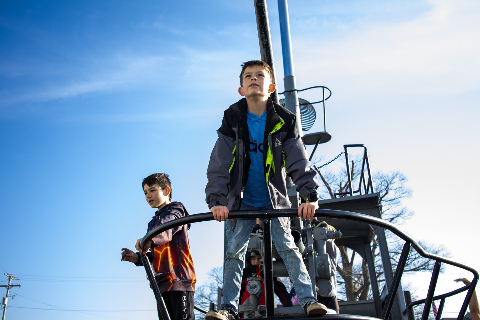 Scouts exploring the deck of the USS Silversides submarine